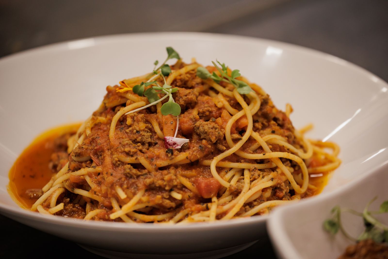 Homemade spaghetti bolognese with parmesan